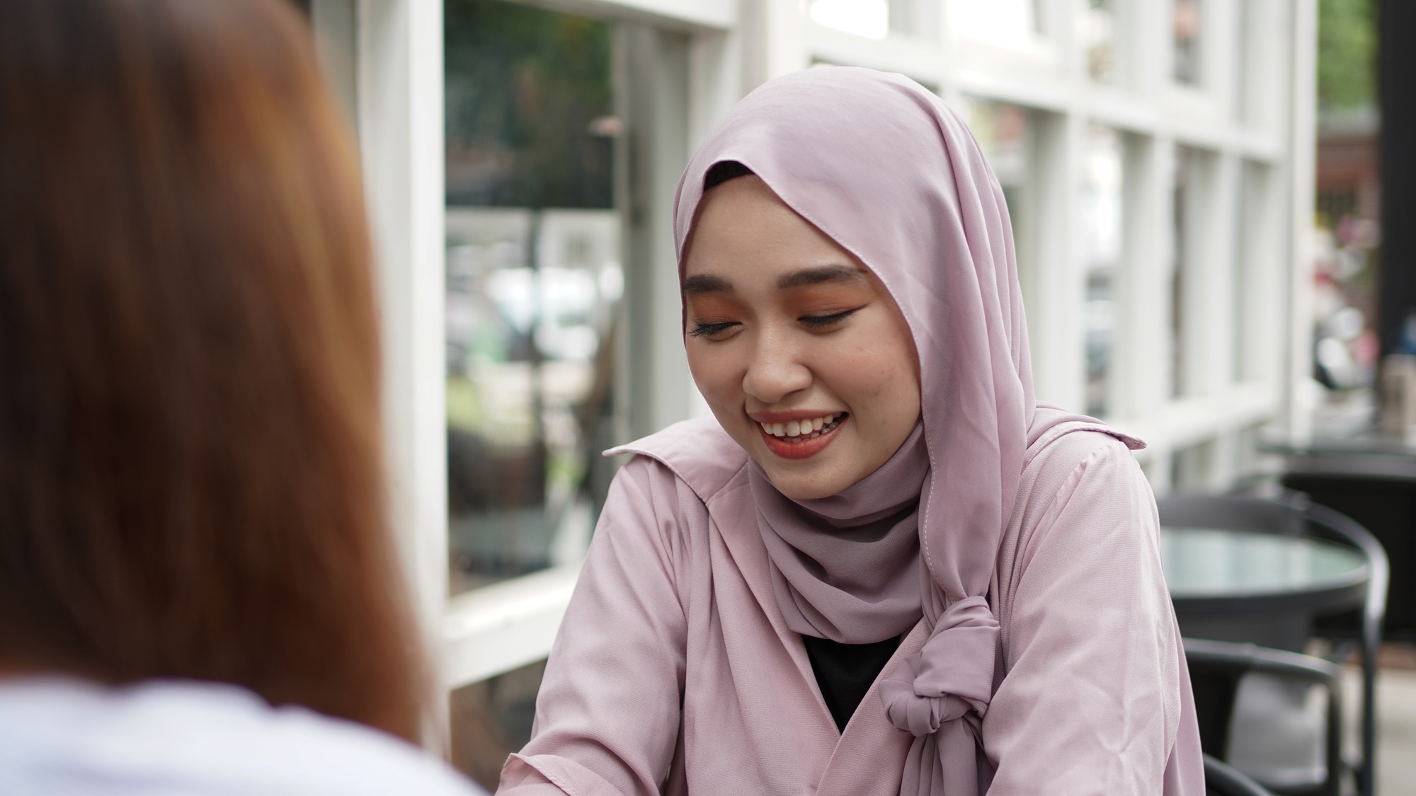 Asian hijab woman activity at cafe